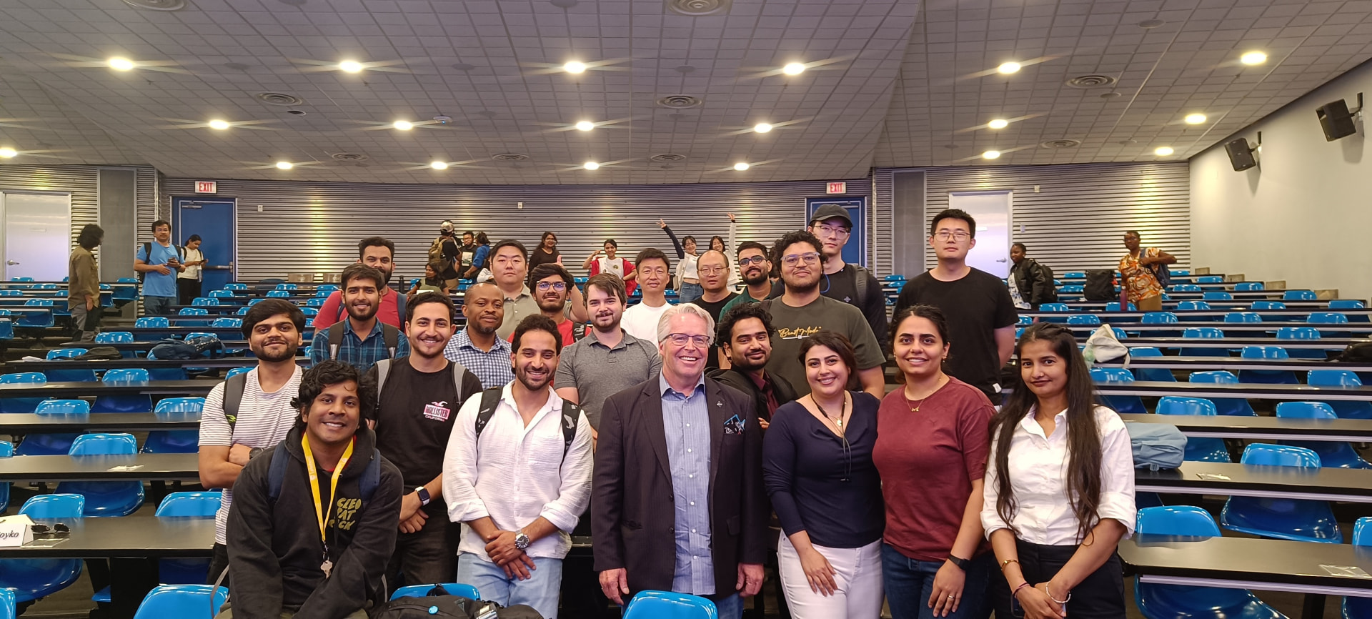 Peter Diedrich with a class of Lakehead University students in a lecture hall