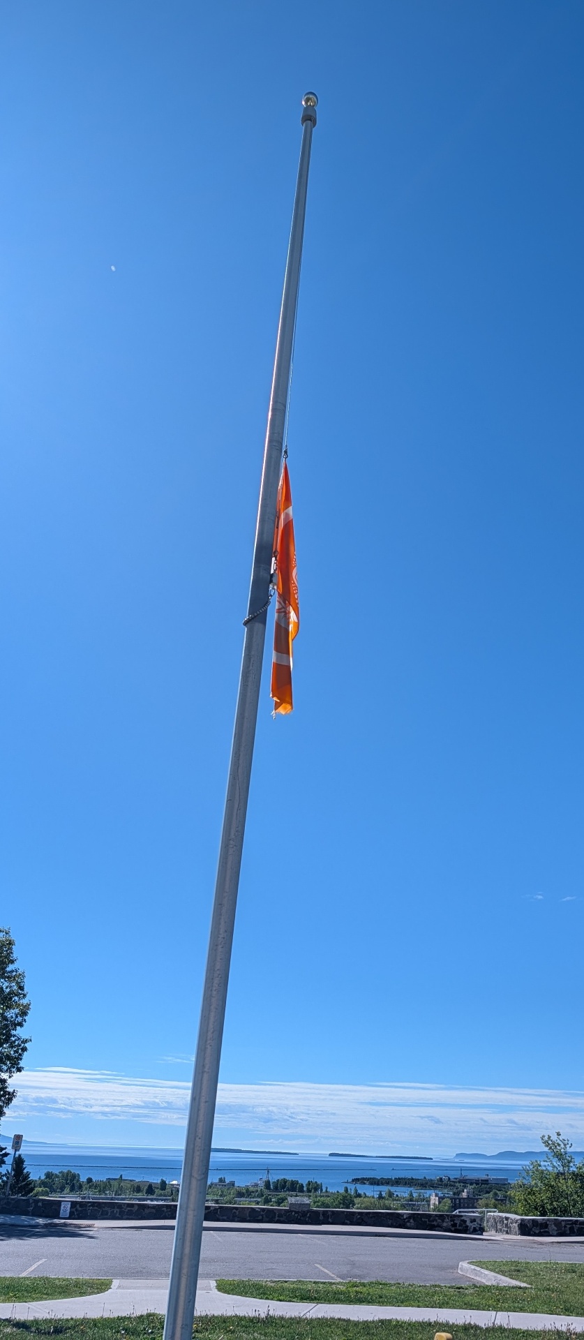Thunder Bay flag and waterfront landscape